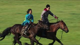 Mongolian kids riding a horse [upl. by Innavoeg]