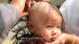 Shaving a girls head as a ritual Lu kokpa mundan ceremony of Manipuri child [upl. by Munniks]