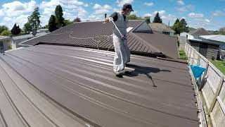 Airless Spray Painting metal roof roofpainting roofspraying [upl. by Ahgiela]