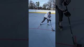 How to do the backhand Michigan hockey puck pick up Hockey tutorial  Hockey lesson [upl. by Soisatsana]