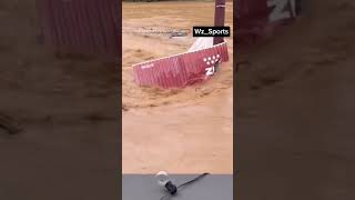 Shipping container crumples after slamming electrical pole rushed floodwaters in North Carolina [upl. by Ardnikal]