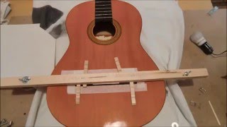 Pegado de un puente nuevo en una guitarra y puesta a punto [upl. by Beaumont384]