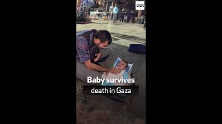 Baby survives death in Gaza [upl. by Areikahs34]