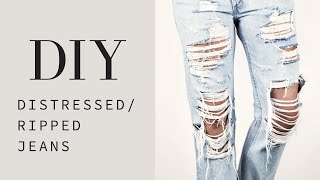 HOW TO  DIY Distressed  Ripped Jeans Tutorial [upl. by Ynnaej279]