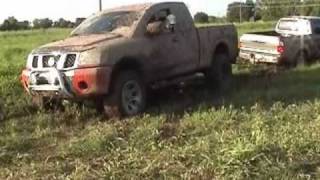 06 Nissan Titan mudding [upl. by Tireb]