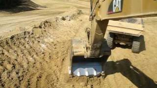 Caterpillar 365C loading 740 B40D and B30D Part 1 [upl. by Mano]