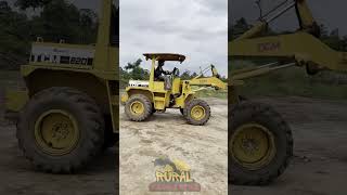 Backhoe loading the Cassava into the truck [upl. by Attesoj289]