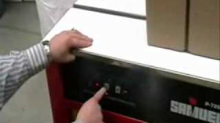 How to use a Strapping Machine  PTIPackagingcom [upl. by Publea720]