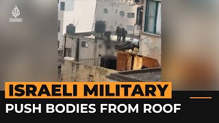 Video captures Israeli soldiers pushing dead bodies from roof  AJ Shorts [upl. by Haidej]