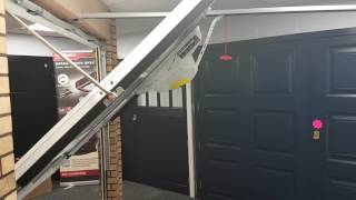 Canopy garage door with Liftmaster LM80EVS and 1703REV convertor arm [upl. by Brana]