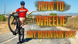 Learn To Wheelie Your Mountain Bike With Ease [upl. by Ewall523]