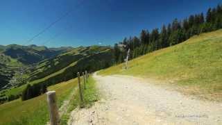 Sommerwandern mit dem Blick in das Tal von Saalbach Hinterglemm Austria [upl. by Berrie]