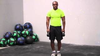 How to Do a Bicep Curl With a Kettlebell  Fitness Fanatics [upl. by Cinimod645]