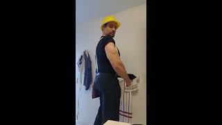 Construction worker flexing his Muscle [upl. by Johannessen822]