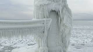 Michigan Lighthouse and Pier Caked in Ice [upl. by Ausoj]