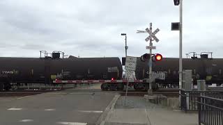 Northbound BNSF 268 leads Job 360 through the Steilacoom Ferry Terminal Railroad Crossing [upl. by Atima287]