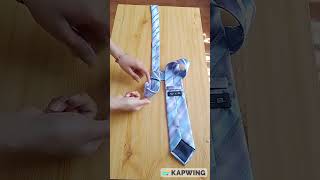 How to Tie a Tie in 10 Seconds Full Windsor Knot [upl. by Aloeda880]