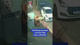 Horrifying moment a doctor falls into a sinkhole [upl. by Hovey]