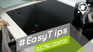 How to use the electric cooktop  Cómo usar la vitrocerámica  EasyTips [upl. by Ozneral]