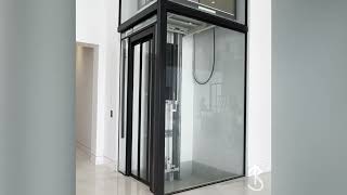 Traditional Home Elevator  Eclipse with sliding doors in glass and black frames Glass Cab [upl. by Lerraj667]