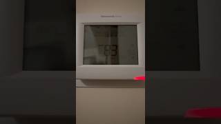 Changing Batteries in a Honeywell Home Thermostat [upl. by Nerad]