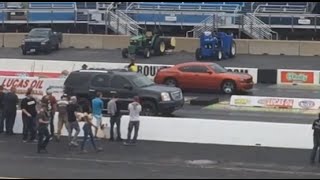 2014 GMC Yukon Denali vs 2010 Dodge Charger RT Daytona Drag Race [upl. by Rosel]