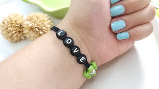 Pulsera de hilo con letras y flor de cristales [upl. by Ilka]