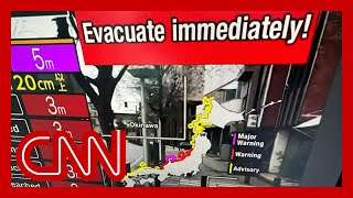 Japan braces for tsunami waves after powerful earthquake [upl. by Rawley138]