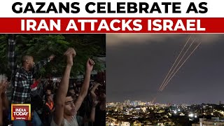 IsraelIran War Gazans Celebrate As Skies Over Israel Flooded With Missiles [upl. by Leese925]