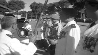 King Norodom Suramarit honors Cambodian troops with badges on National Day in PhnHD Stock Footage [upl. by Atikaj]