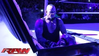 Undertaker rises from a coffin to attack Brock Lesnar Raw March 24 2014 [upl. by Ainaled]