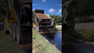 Nothing beats some brown pea gravel 🤩  🎥 southernsunpaving9979 asphaltpavement construction [upl. by Layman520]