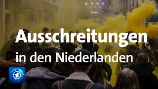 Protest gegen CoronaMaßnahmen Neue Ausschreitungen in den Niederlanden [upl. by Ellatsyrc]