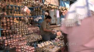 Brass and Copper prayer items for sale in a Varanasi market [upl. by Onailerua]