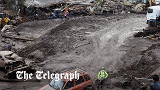 Ecuador Victim stuck in mud as deadly landslide sweeps through capital Quito [upl. by Asilanna379]