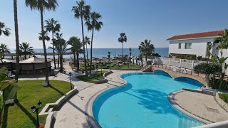 Lordos Beach Hotel amp Spa Larnaca Cyprus Reception breakfast at Atlantis restaurant swimming pools [upl. by Aiyn]