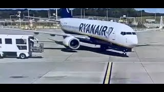 A catering truck hit a Ryanair Boeing 737800 arriving in stand at London Stansted [upl. by Reinar62]