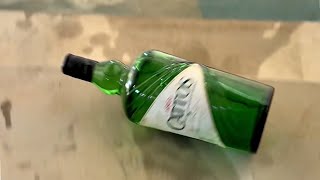 Breaking glass bottles satisfying video  throwing glass bottles  break and crunchy experment [upl. by Fatma540]