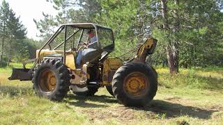 John Deere 440B Cable Skidder [upl. by Enilemme]