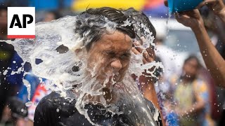 Thailand kicks off Songkran festival celebrating new year with street water fights [upl. by Sadira491]