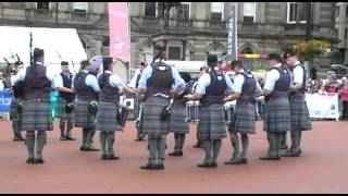 Cullen Pipe Band 44s in Glasgow Georges Square 2011 avi [upl. by Ethbun72]