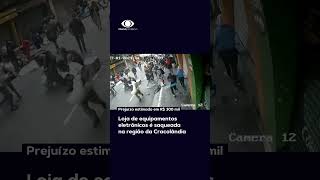 Grupo invade e saqueia loja na Cracolândia região central de São Paulo shorts [upl. by Akcirahs]