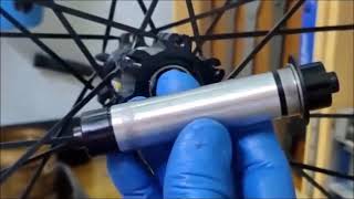 EP121 Mavic crossride disc 26 front hub service [upl. by Aehc]