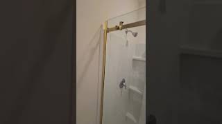 The shower shop owner installed the sliding shower door and was very happy with it [upl. by Nilac]