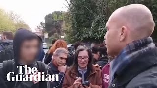 Boy confronts farright activists protesting against Roma refugees in Italy [upl. by Muffin376]