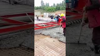 Concrete paving process with the road roller [upl. by Anaile]