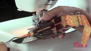 How to use the Janome Coverpro Binder Attachment [upl. by Marylee]