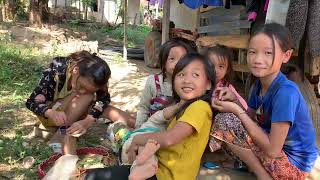 Khmu Village on the Road to Kuang Si Waterfalls Luang Prabang Laos [upl. by Anyrak719]