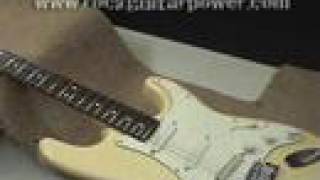 Adjusting the string heightaction on your guitar [upl. by Nauqyt]