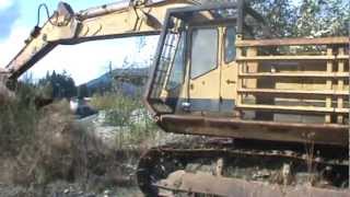 Caterpillar 235 excavator [upl. by Eltsyrhc]